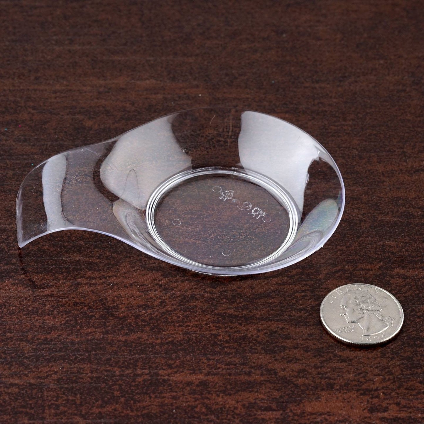 Clear round plastic dessert plate with handle, perfect for dipping.