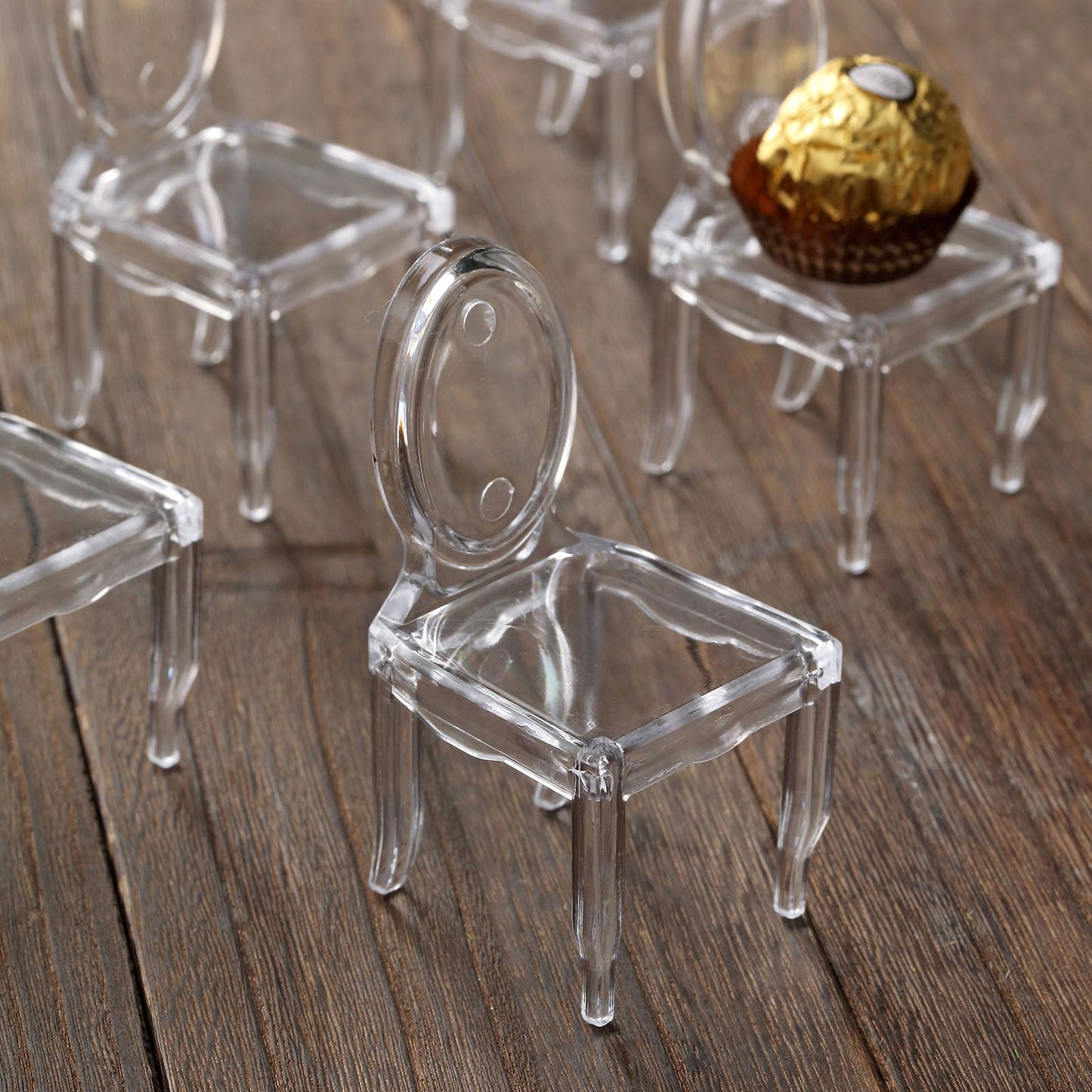 Clear chair-shaped party favor holders for candy treats, 12 pack.