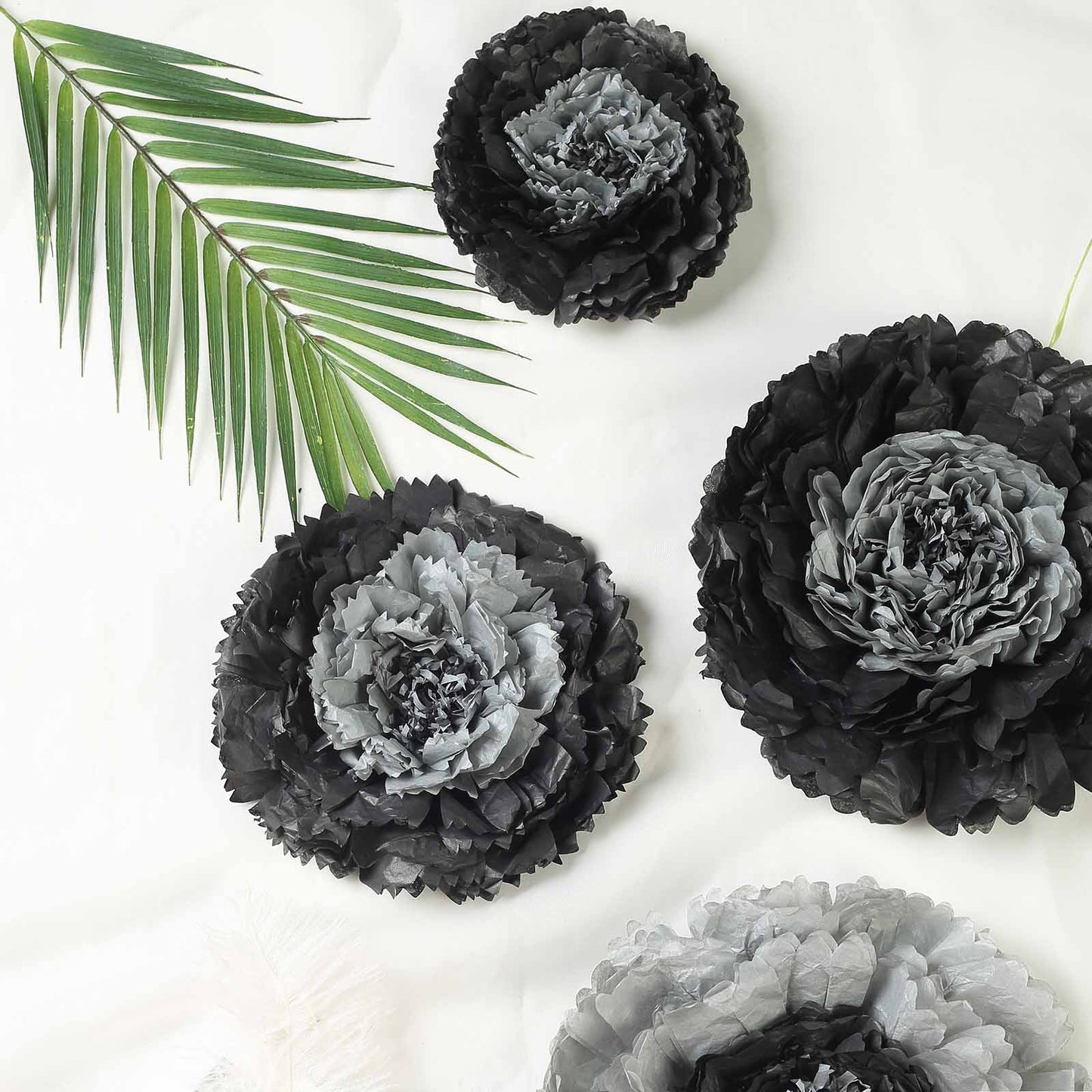 Charcoal gray 3D giant paper flowers for wedding backdrops.