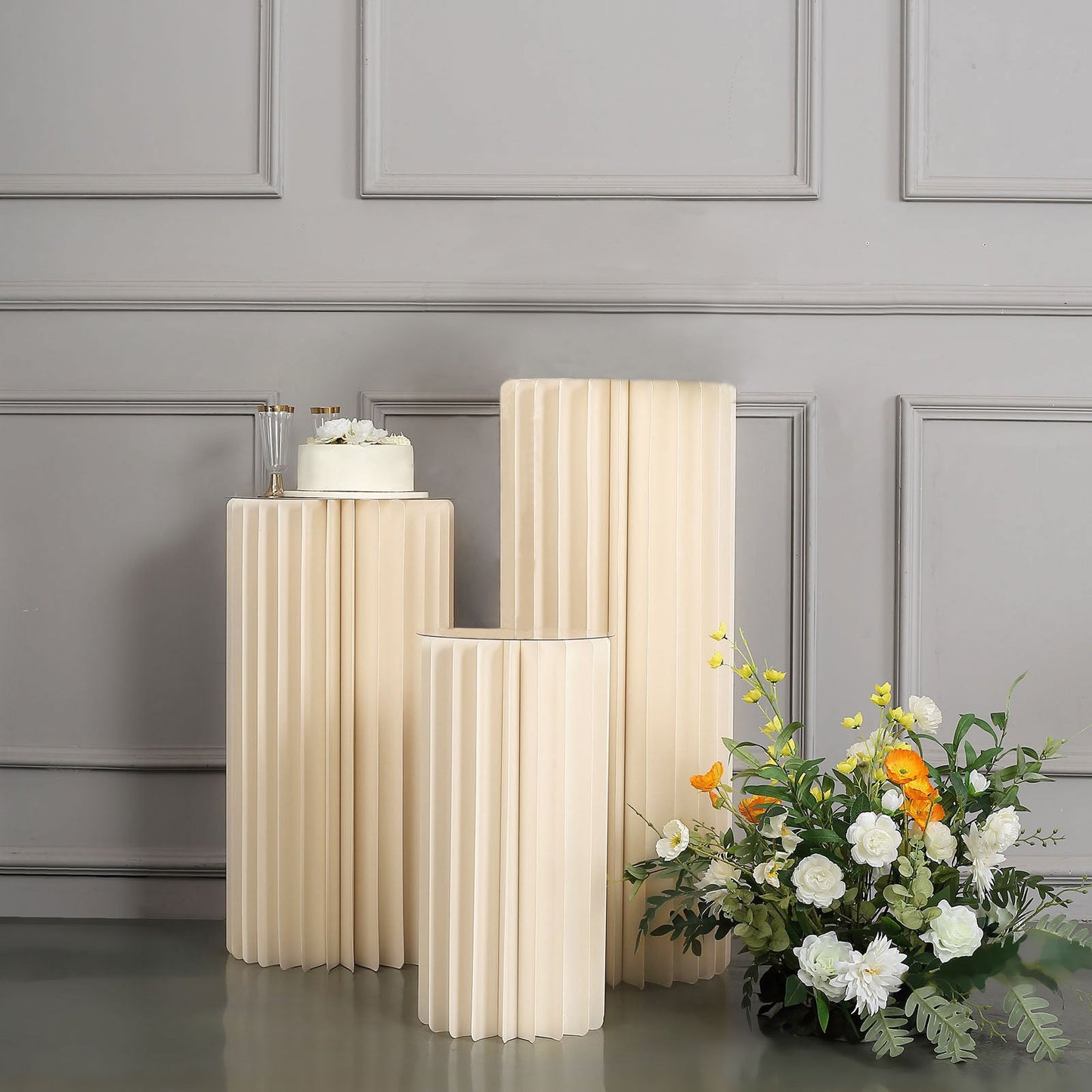 Ivory cylinder display column stand with top plate, perfect for events and decor.