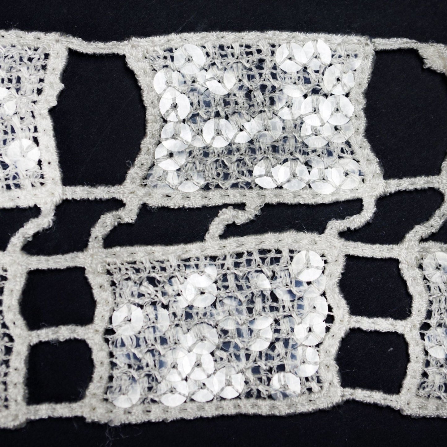 White sequin stitch crochet ribbon, 4" x 5 yards for granny square patterns.