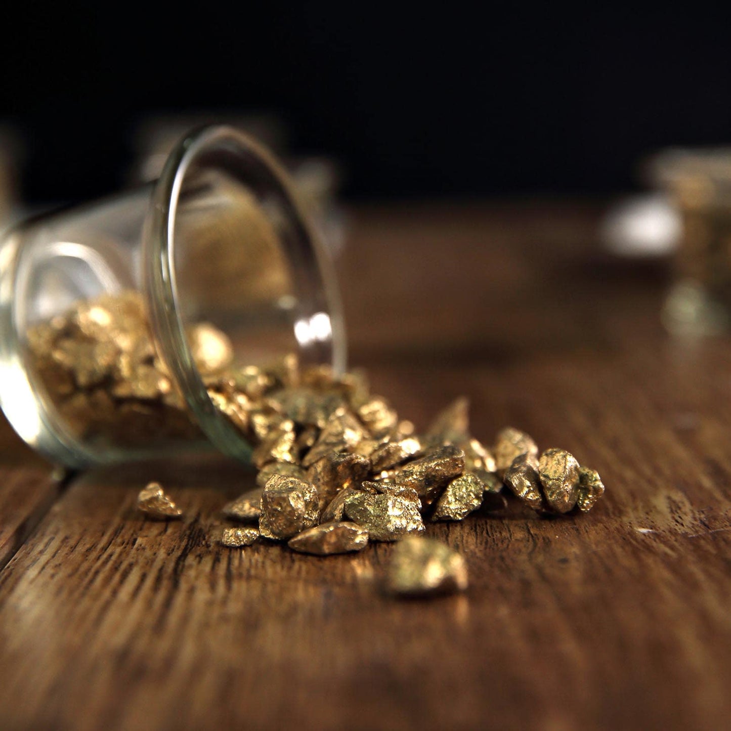Metallic gold decorative crushed gravel vase fillers.