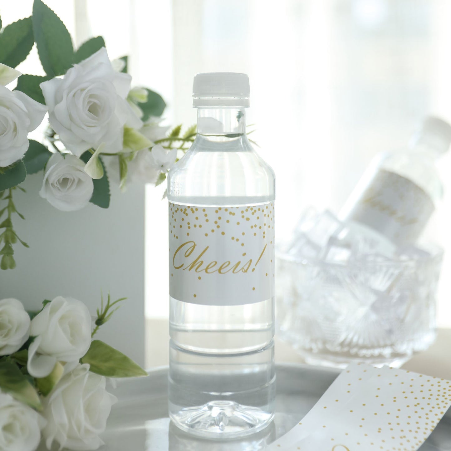 White and gold waterproof water bottle label "Cheers!" for weddings.