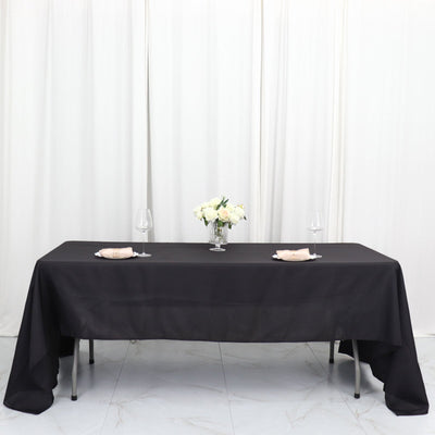 Elegance Redefined with the Black Seamless Polyester Tablecloth Elegance Redefined with the Black Seamless Polyester Tablecloth