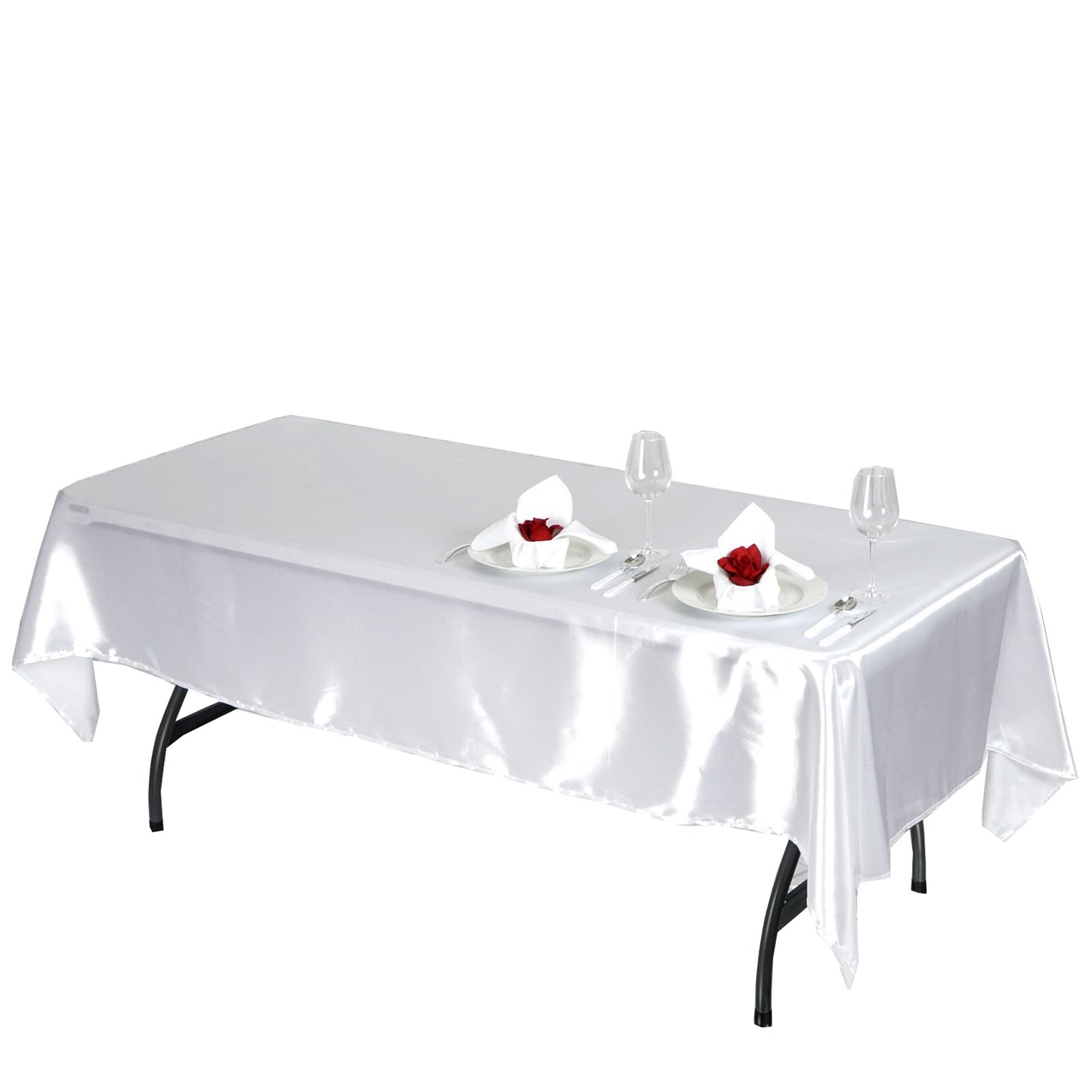 White seamless smooth satin rectangular tablecloth on a dining table.