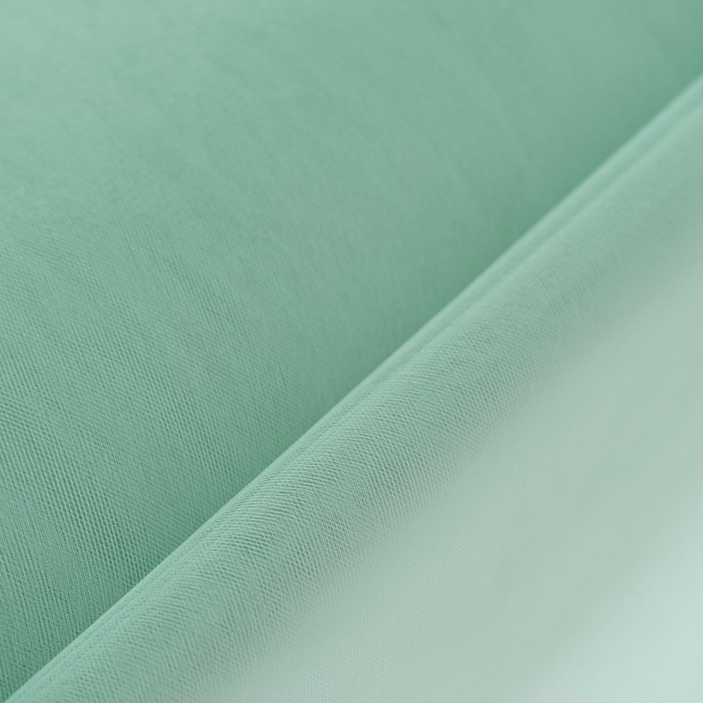Sage green tulle fabric roll, 108"x50 yards, perfect for DIY crafts.