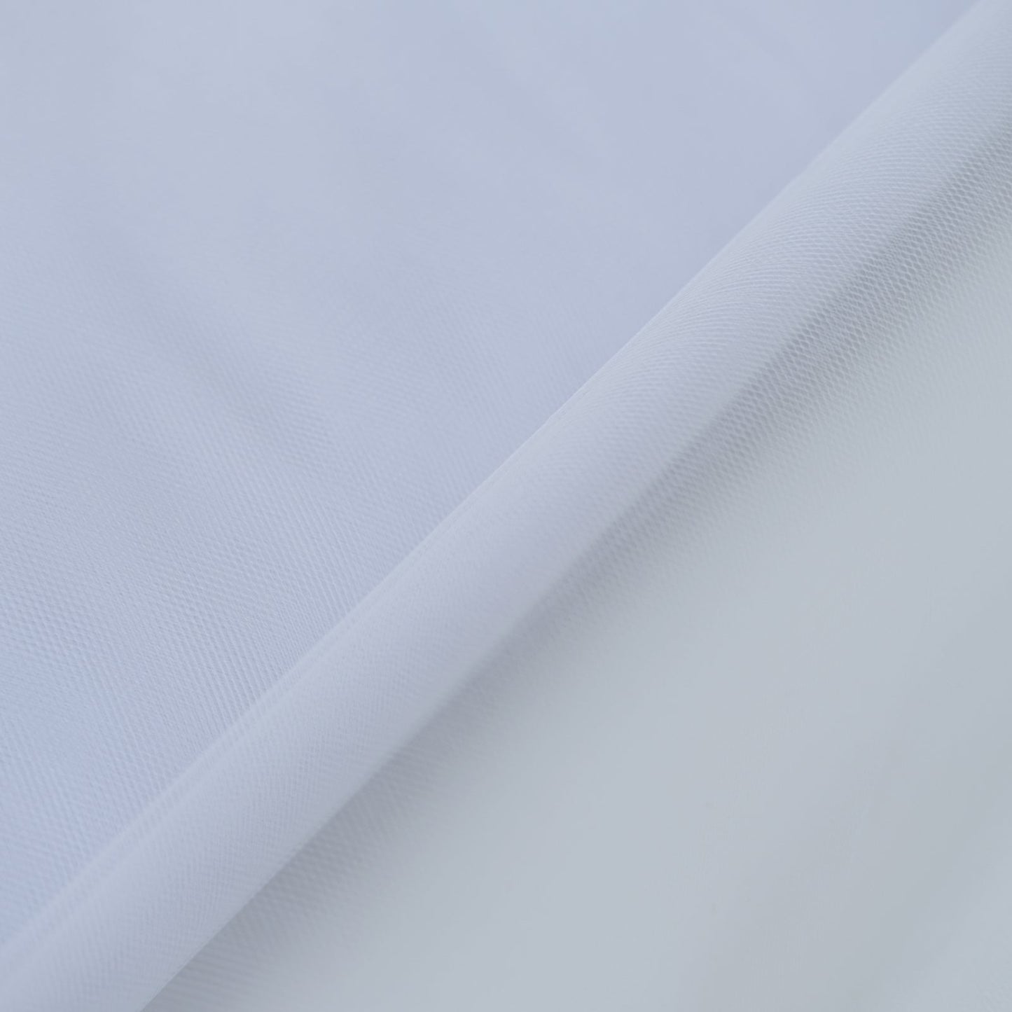White tulle fabric bolt, 54"x40 yards for DIY crafts.