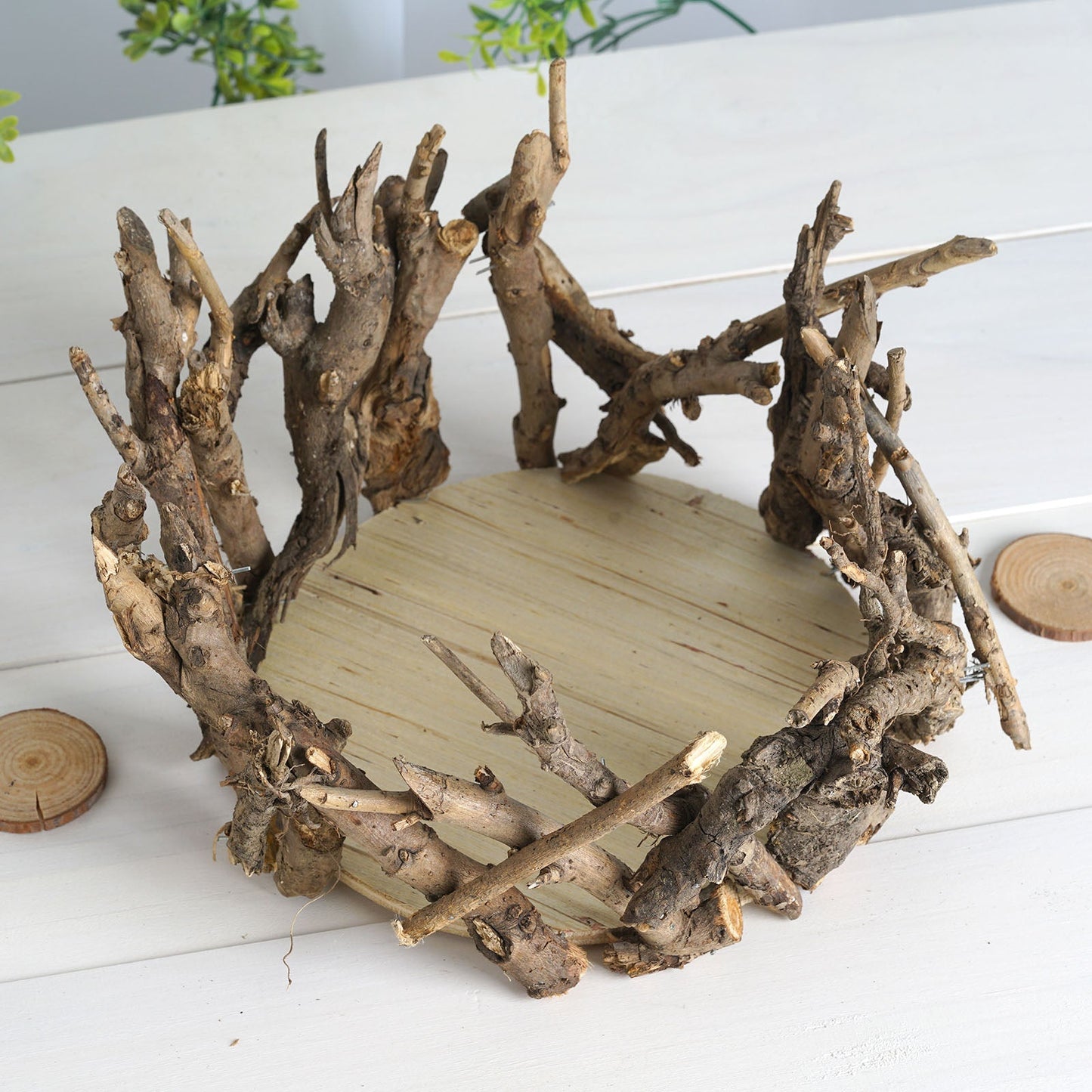 Natural wooden candle holders and mini vases for rustic wedding centerpieces.