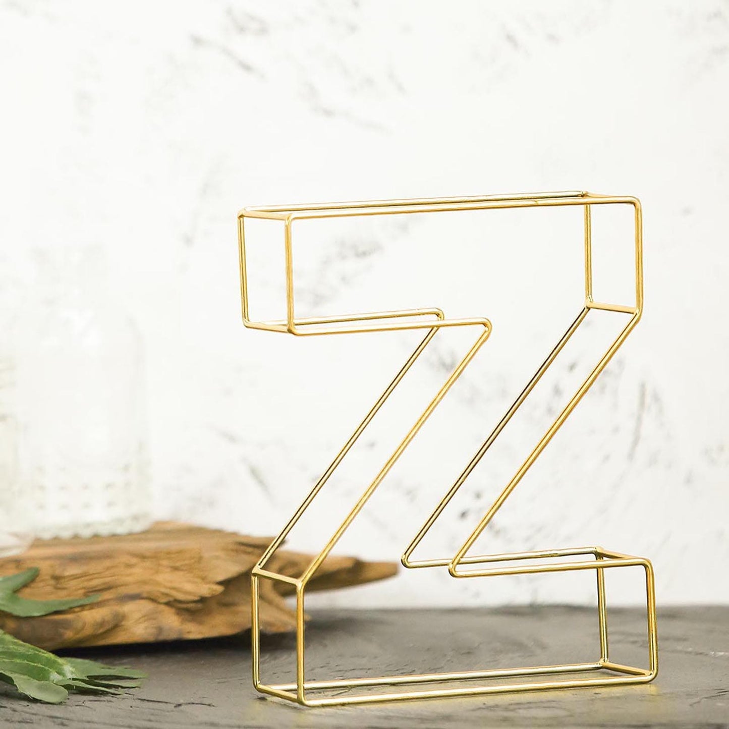 Gold freestanding 3D decorative wire letter "Z" wedding centerpiece.