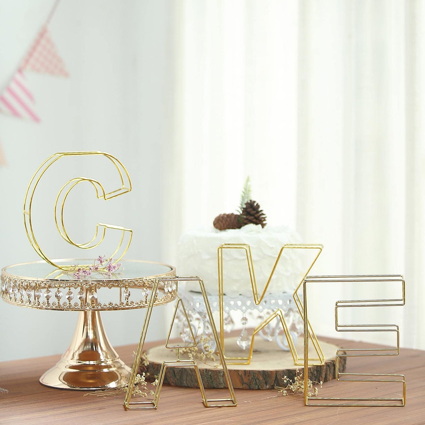 Gold freestanding 3D decorative wire letter "E" wedding centerpiece.