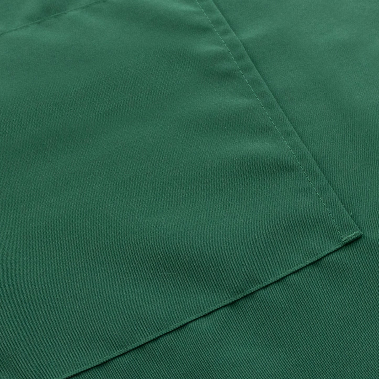 Emerald green premium polyester cooking chef apron with pockets.