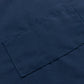 Navy blue cooking chef apron with adjustable neck and two pockets.