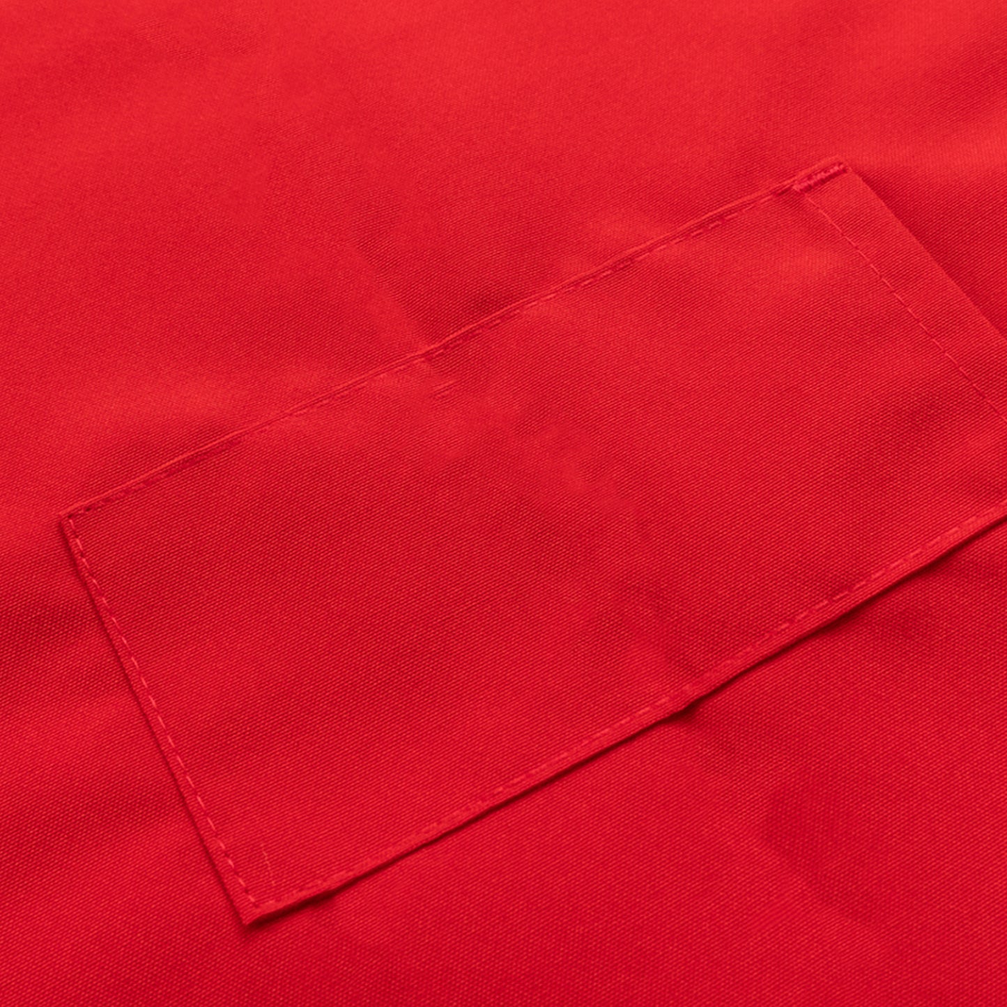 Red premium polyester cooking chef apron with adjustable neck and two pockets.