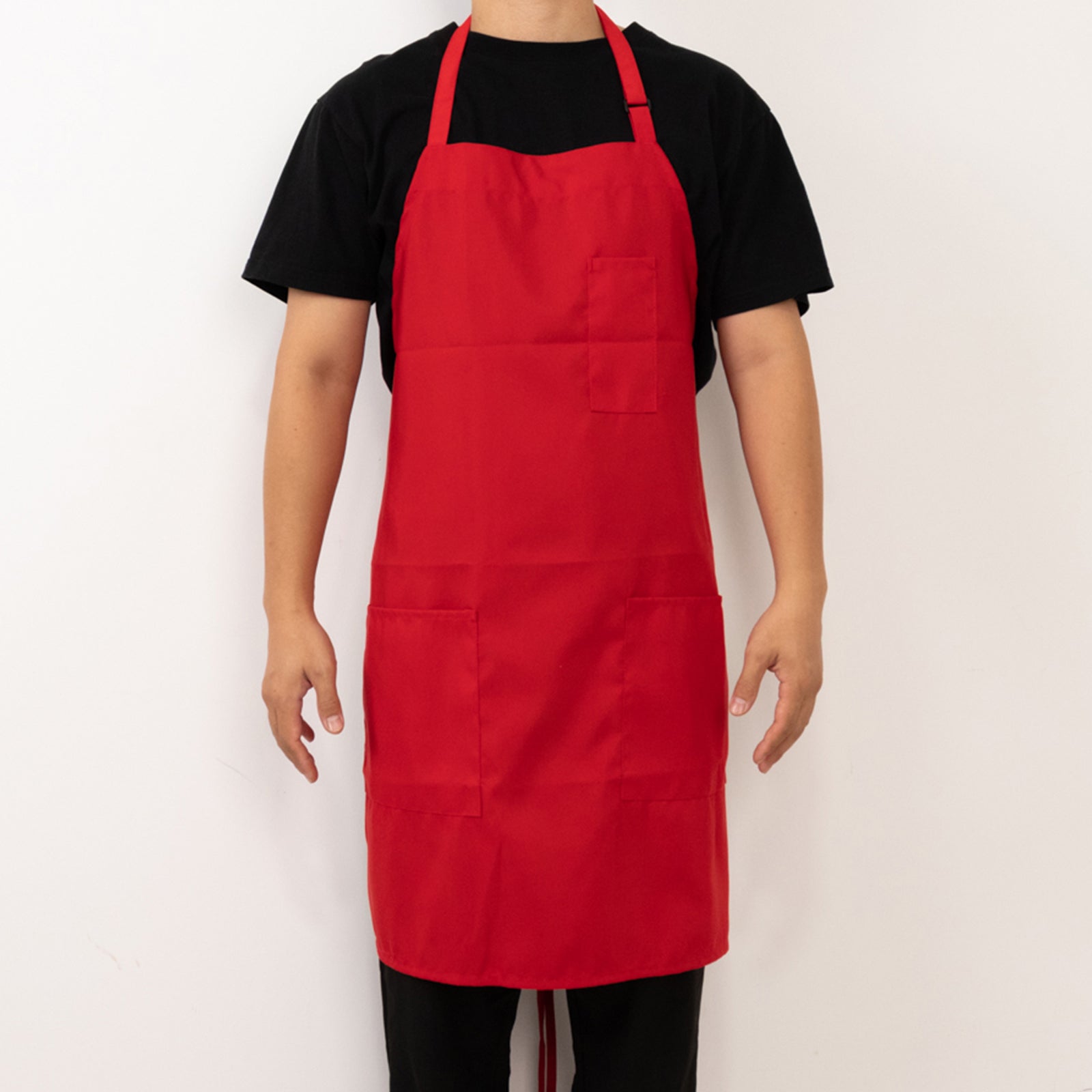 Red premium polyester chef apron with adjustable neck and long ties.
