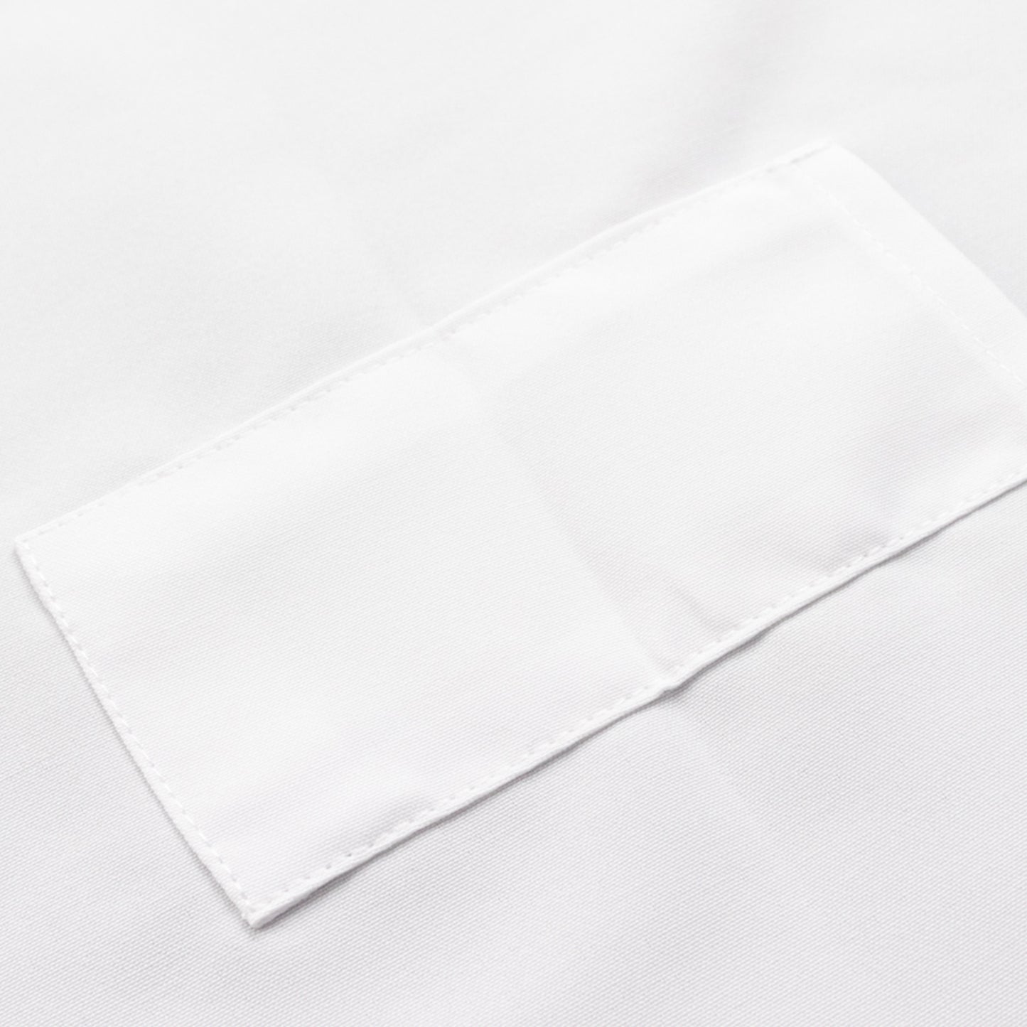 White premium polyester cooking chef apron with adjustable neck and long ties.