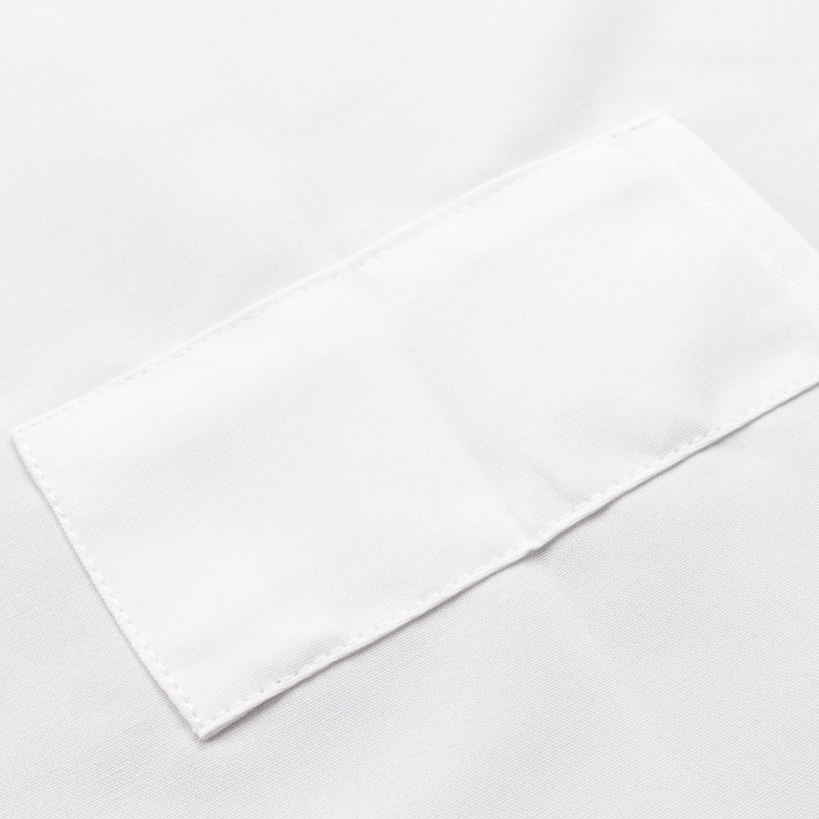 White premium polyester cooking chef apron with adjustable neck and long ties.