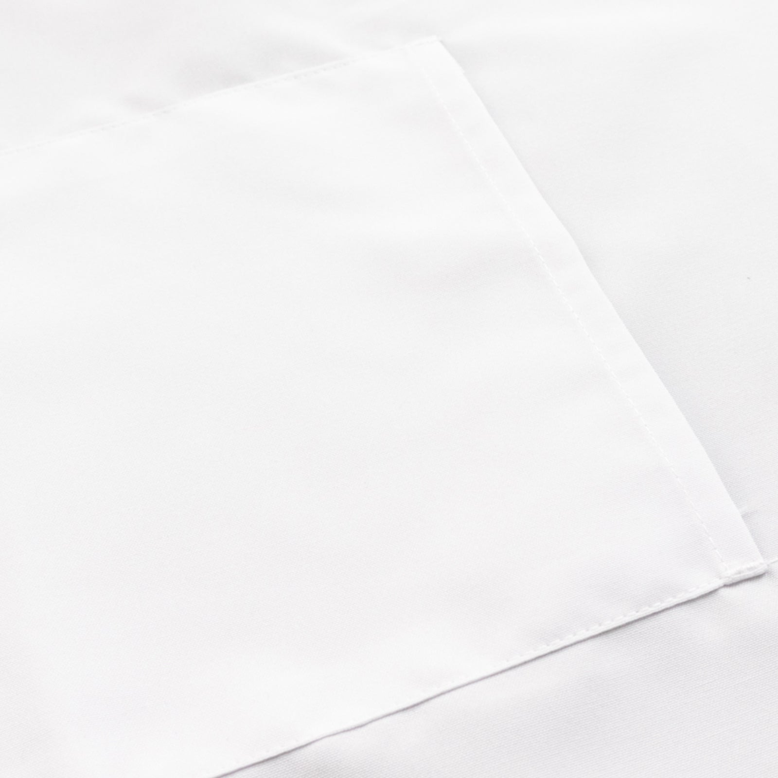 White premium polyester cooking apron with pockets.