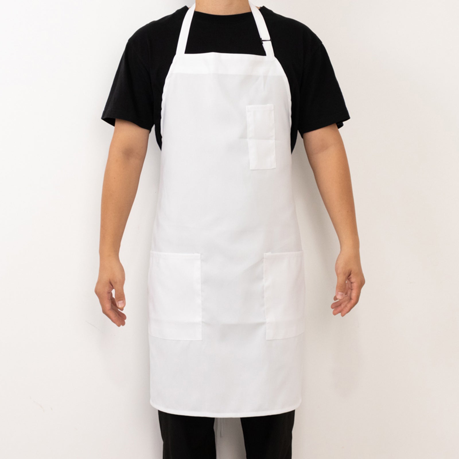 White unisex cooking apron with adjustable neck and two pockets.