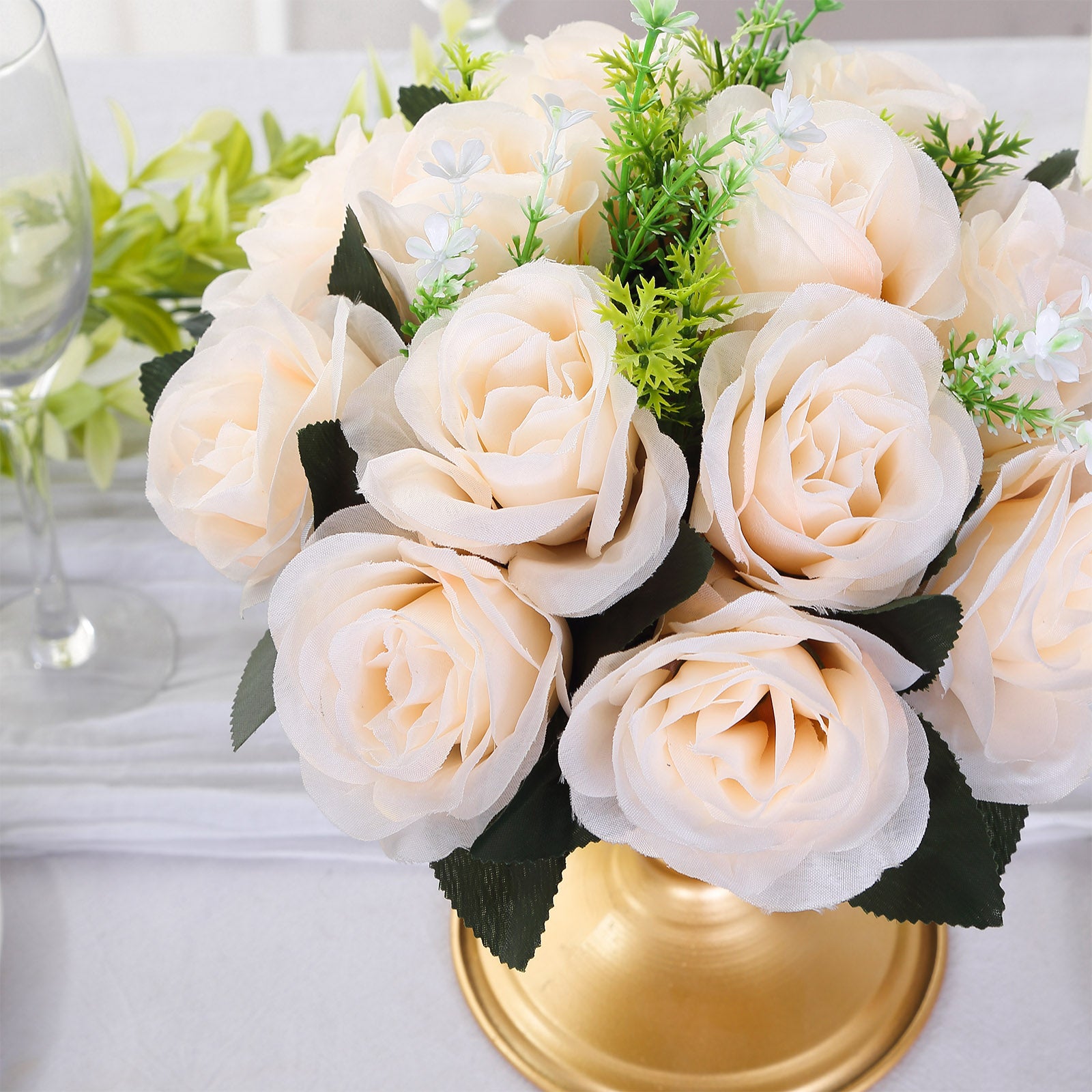 Cream silk rose flower ball centerpiece arrangement.