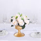 Cream silk rose flower ball centerpiece arrangement in a gold vase.