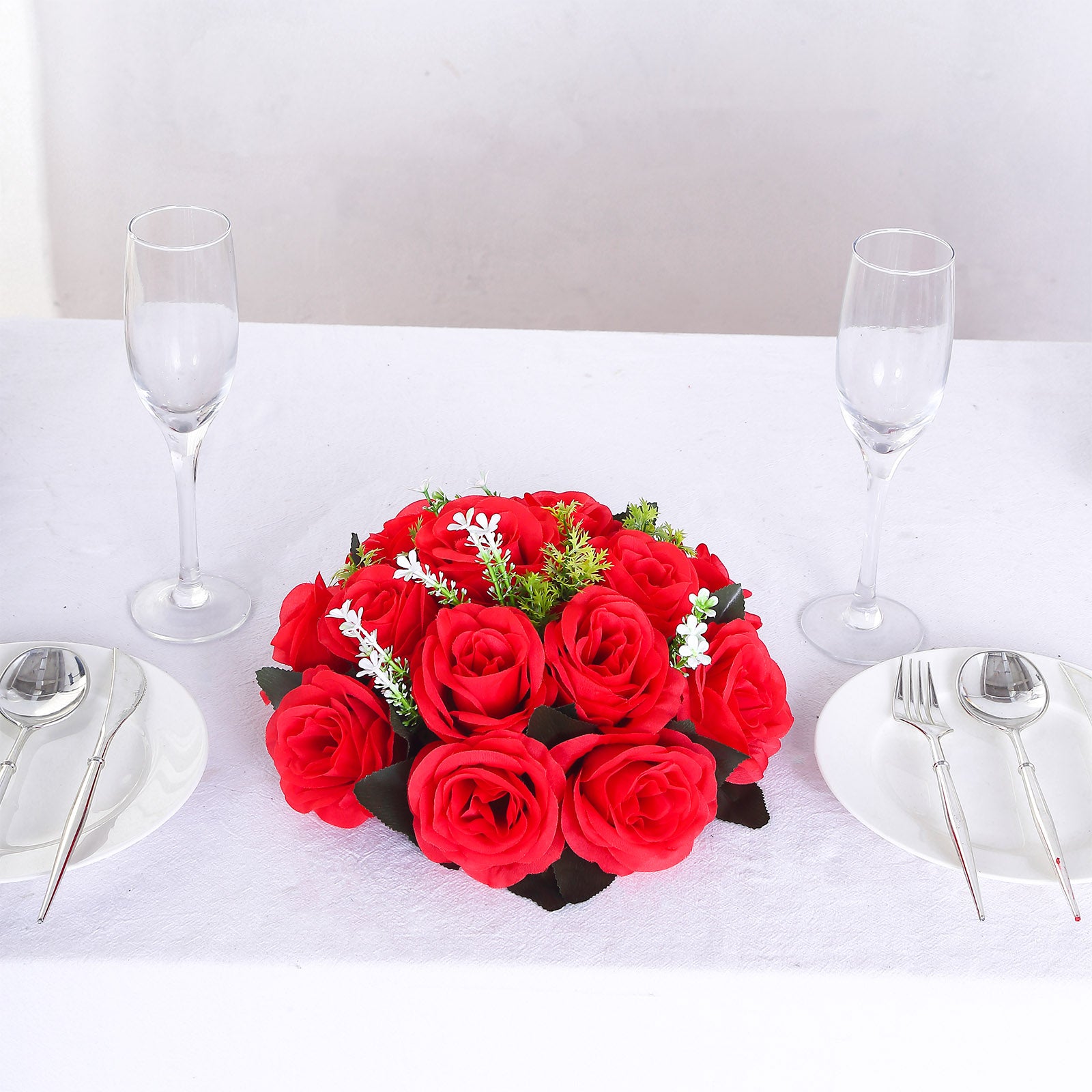 Red silk rose flower ball centerpiece arrangement.