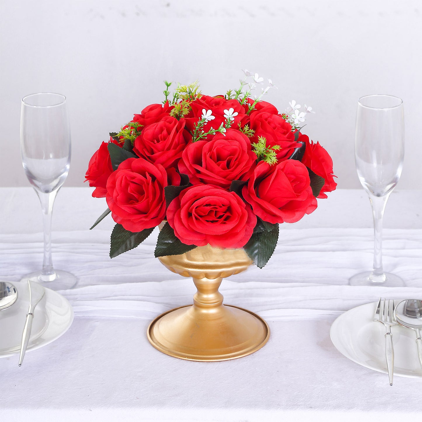 Red silk rose flower ball centerpiece arrangement.