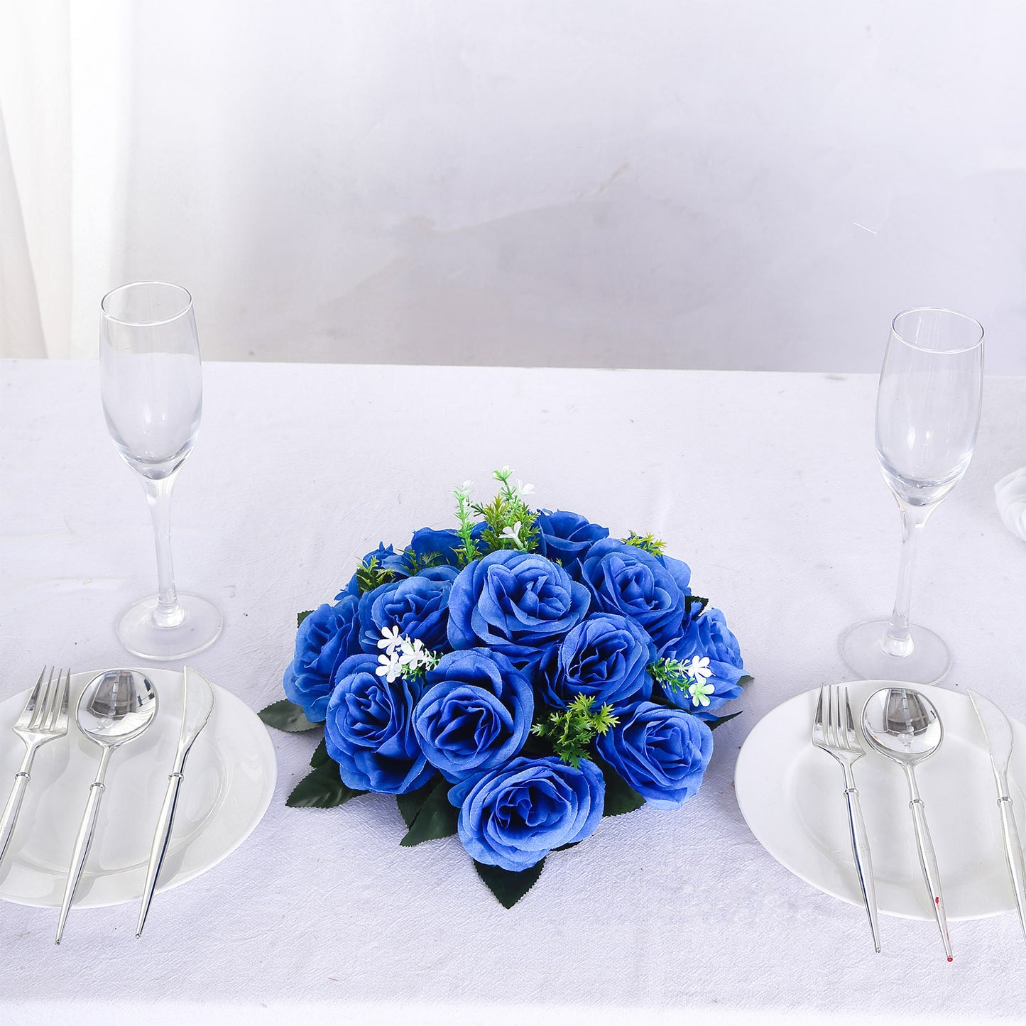 Royal blue artificial rose flower ball centerpiece arrangement.