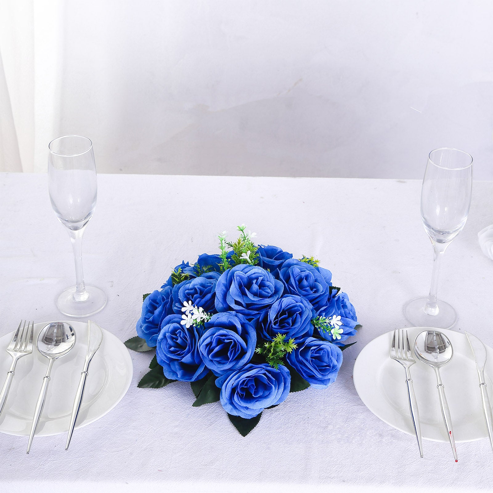 Royal blue artificial rose flower ball centerpiece arrangement.