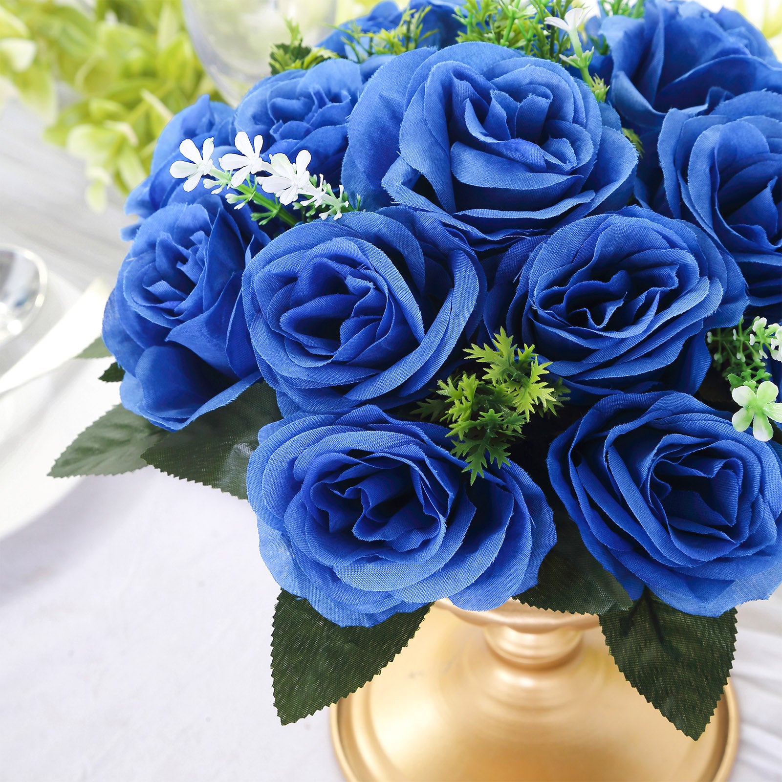 Royal blue silk rose flower ball arrangements for centerpieces.