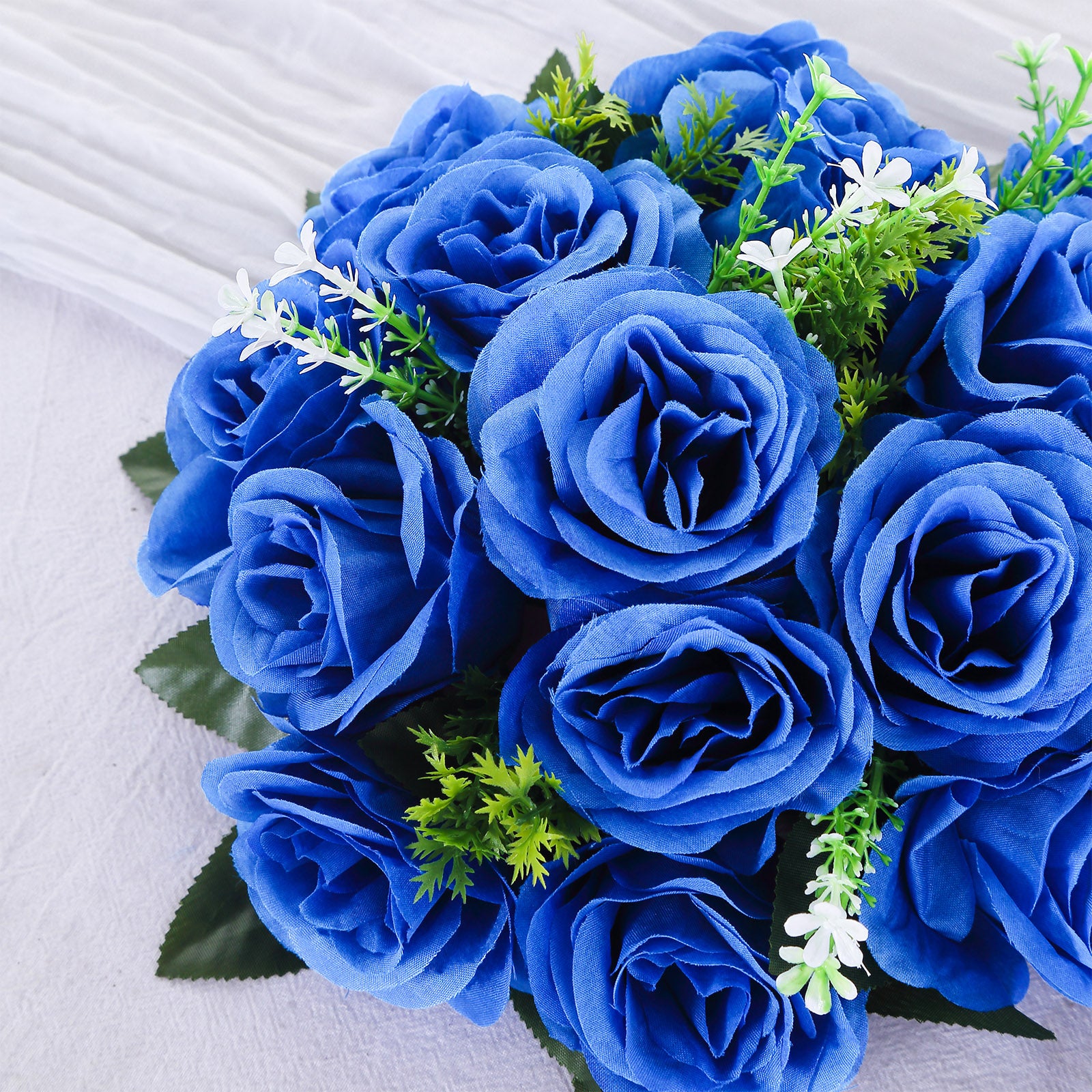 Royal blue silk rose flower ball arrangement for centerpieces.