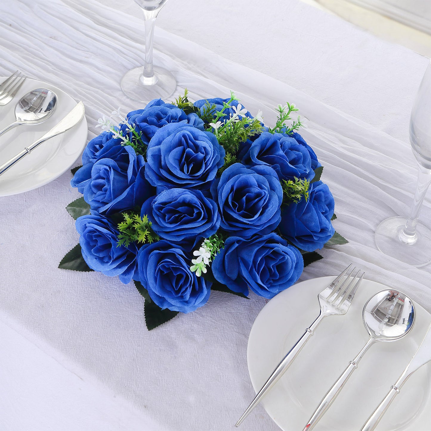 Royal blue silk rose flower ball centerpiece arrangement.