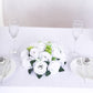 White silk rose flower ball centerpiece arrangement for table decor.