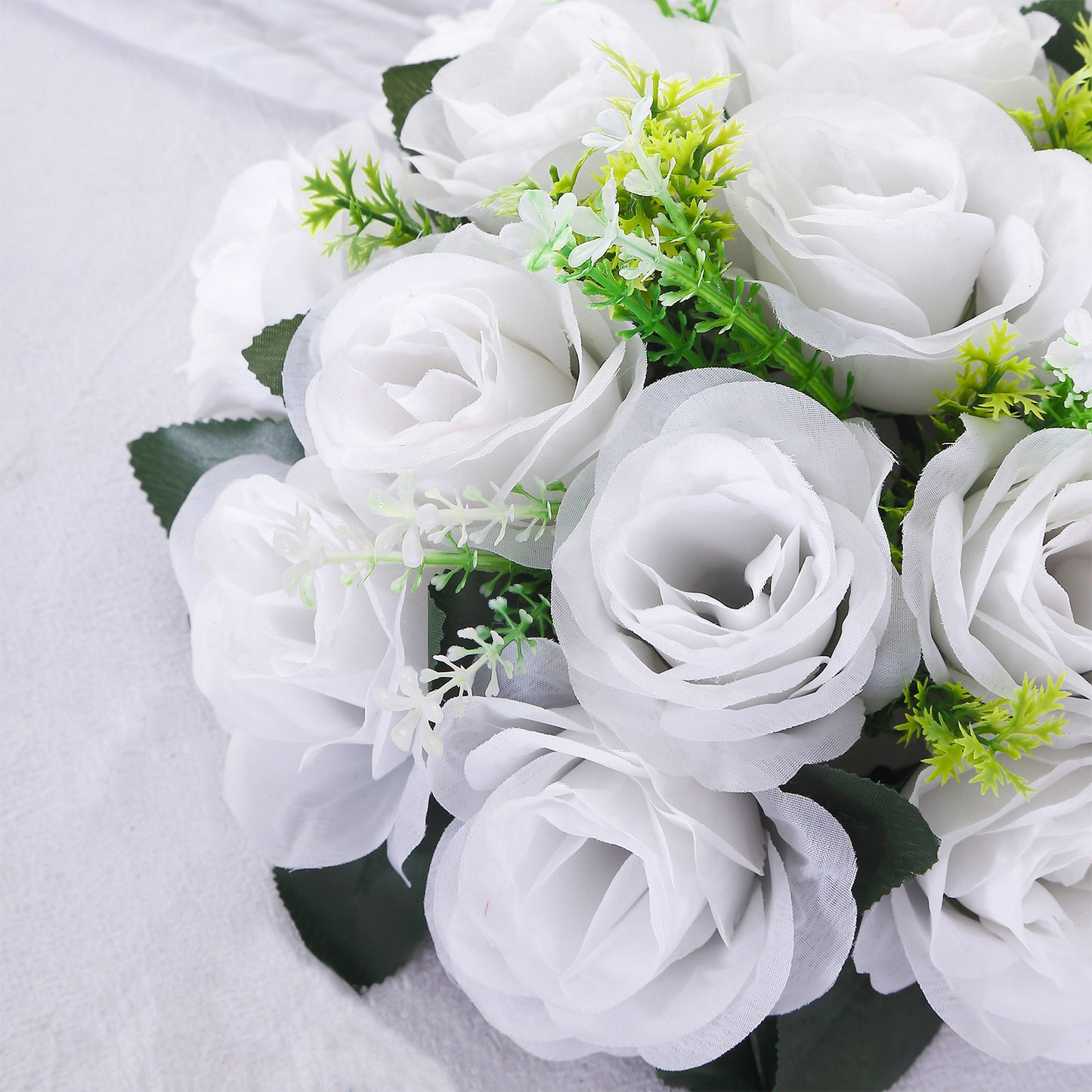 White silk rose flower balls for centerpieces, artificial floral arrangements.