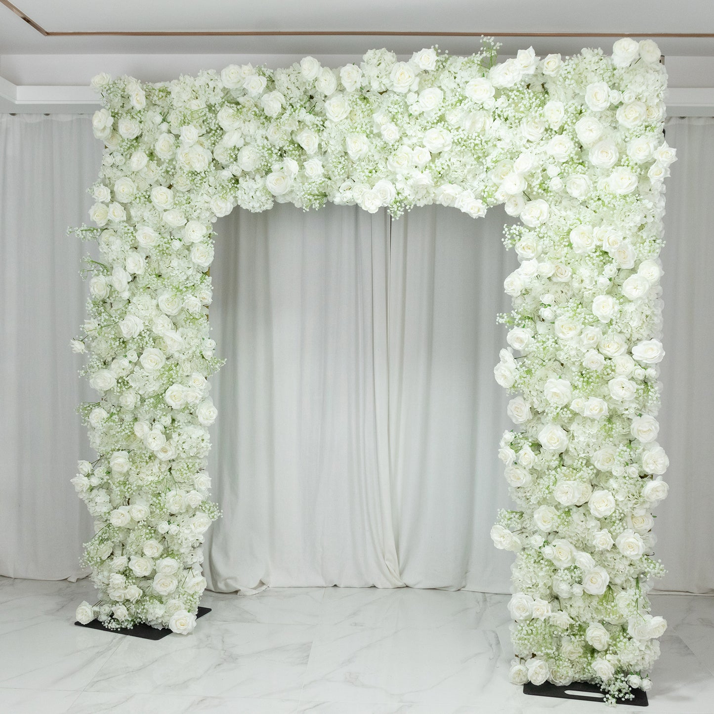 White silk rose and baby's breath flower backdrop for wedding arch.