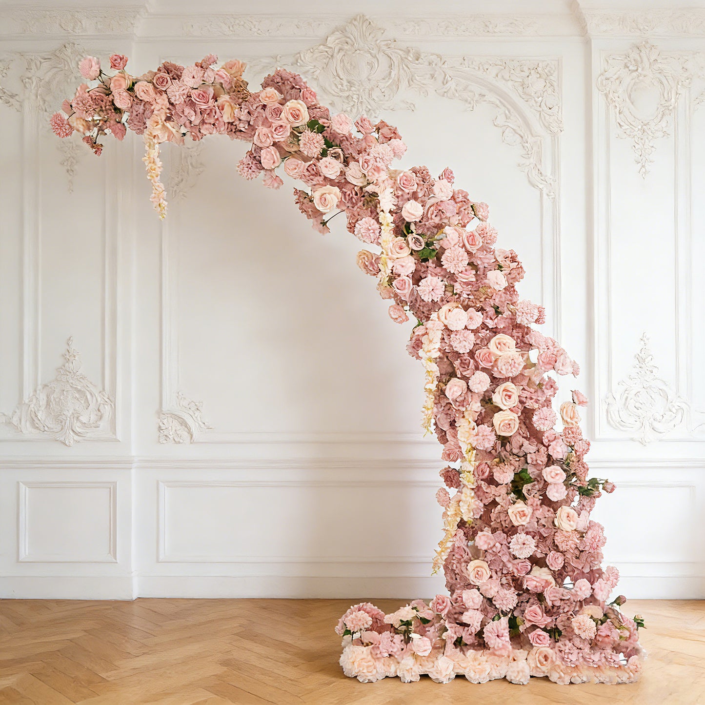 Dusty rose floral backdrop for a wedding arch with roses and hydrangeas.