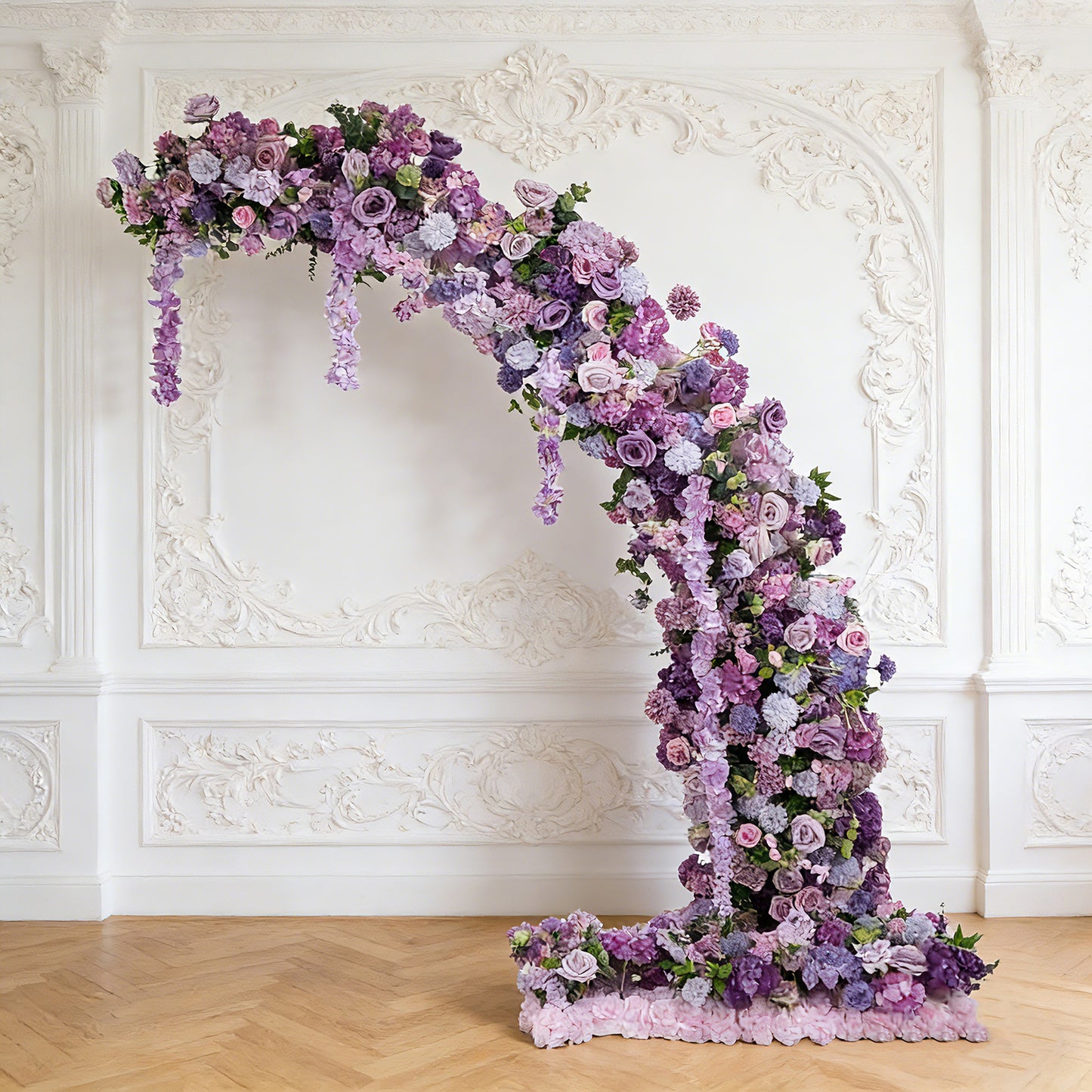 Lavender floral backdrop arch adorned with roses and hydrangeas.