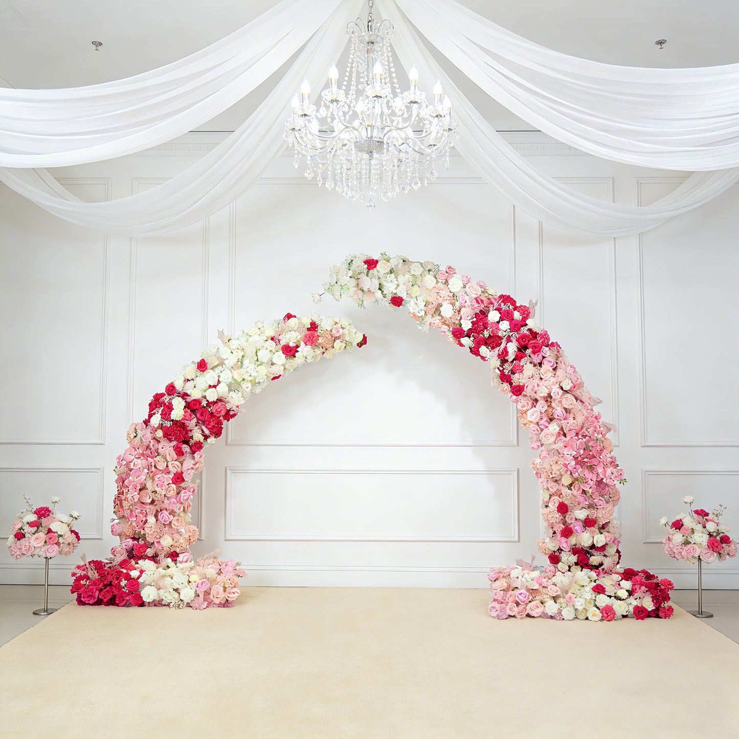 White and pink floral backdrop for a wedding arch with roses and hydrangeas.