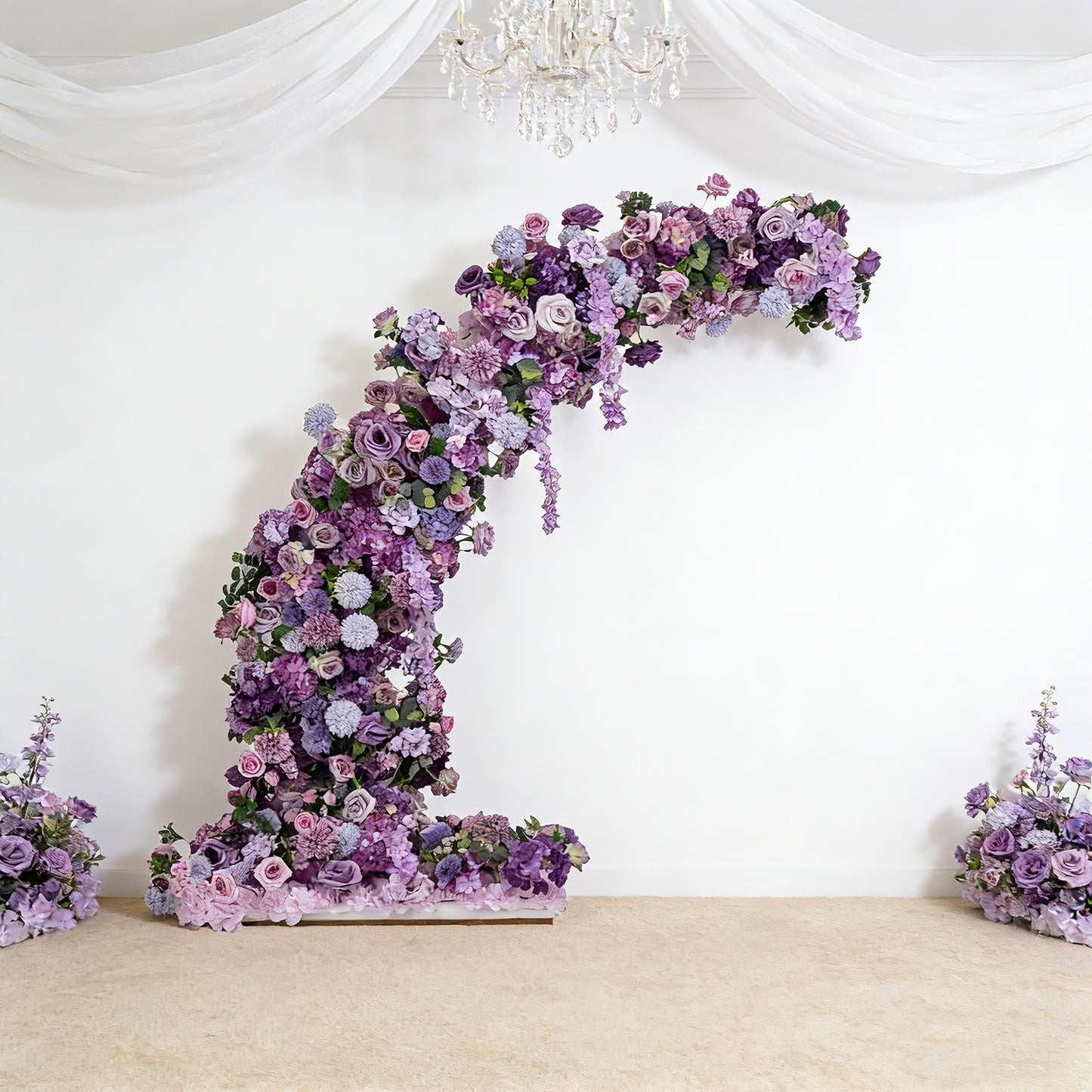 Lavender floral backdrop arch with roses, hydrangeas, and chrysanthemums.
