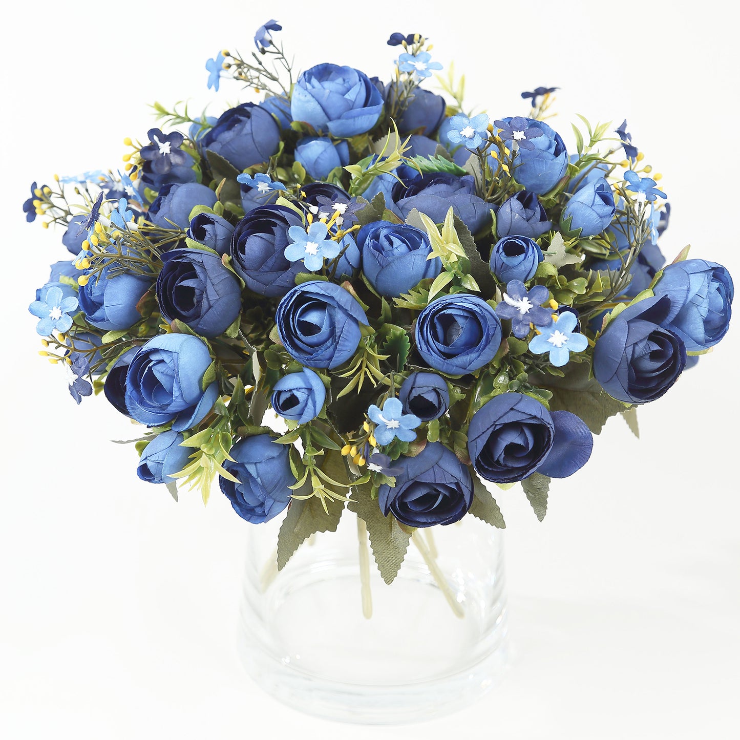 Navy blue artificial ranunculus floral arrangement in a clear vase.
