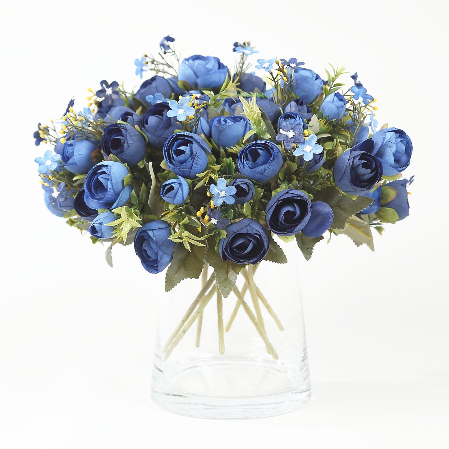 Navy blue artificial ranunculus floral bouquet in a clear vase.