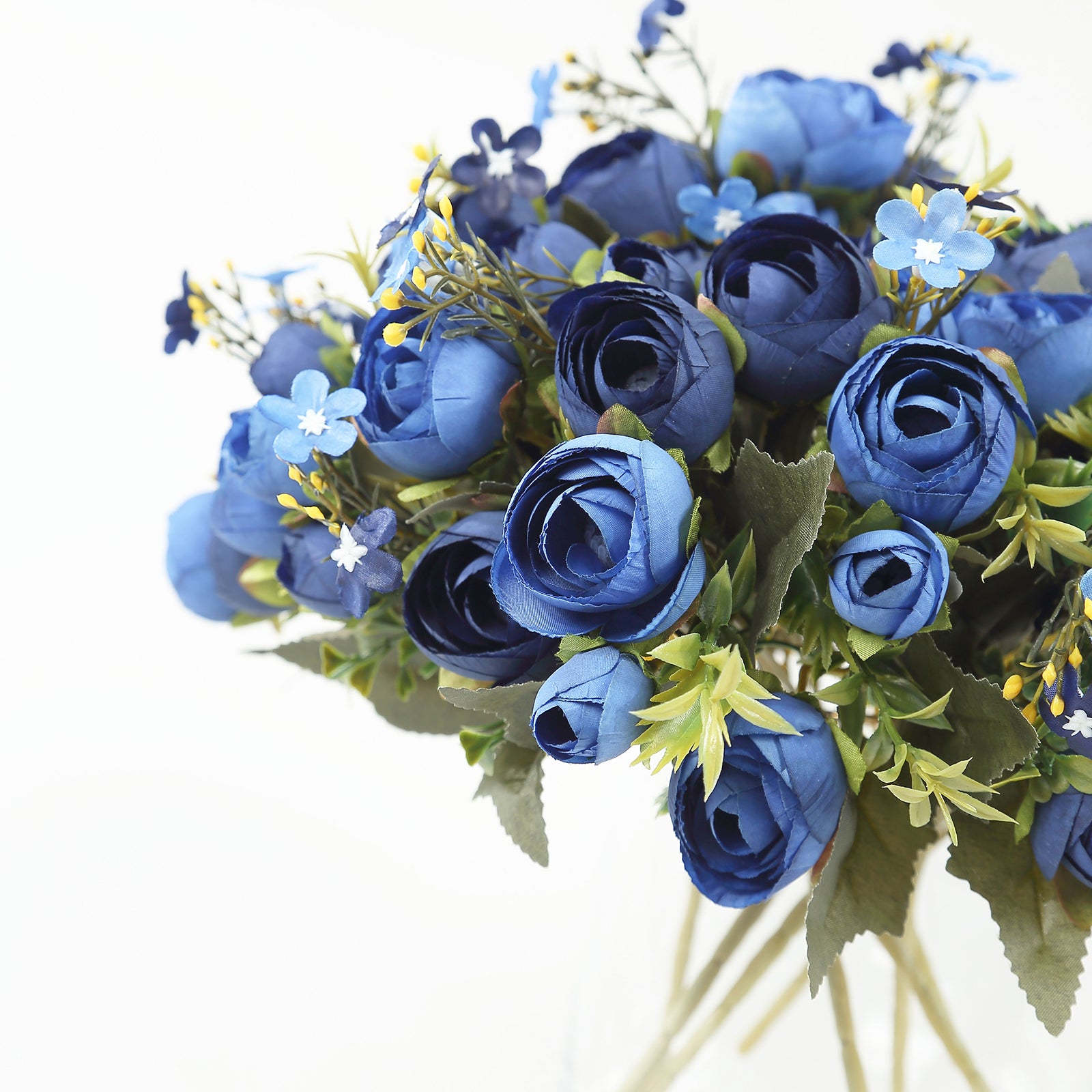 Navy blue artificial ranunculus bouquet with floral accents.