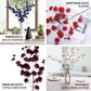 Blush artificial silk carnation flower stems in a decorative arrangement.