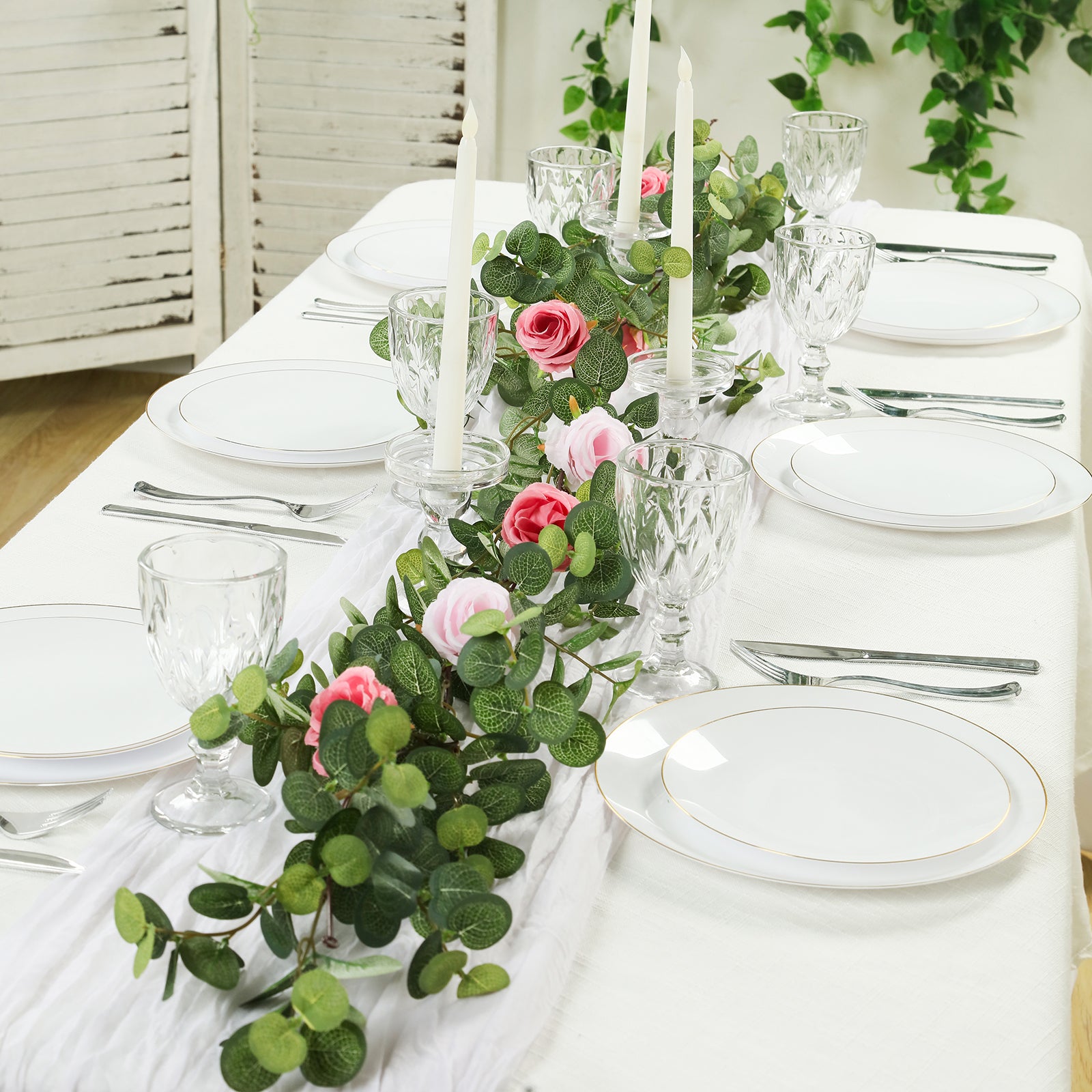 Blush and dusty rose eucalyptus garland for elegant table decor.
