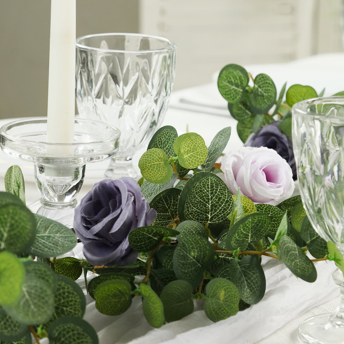6ft artificial eucalyptus garland with lavender and purple silk roses.