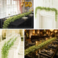 6.5ft green artificial wandering peperomia leaf garland for table decoration.
