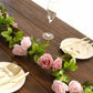 Blush dusty rose artificial silk flower garland with mini roses and greenery.