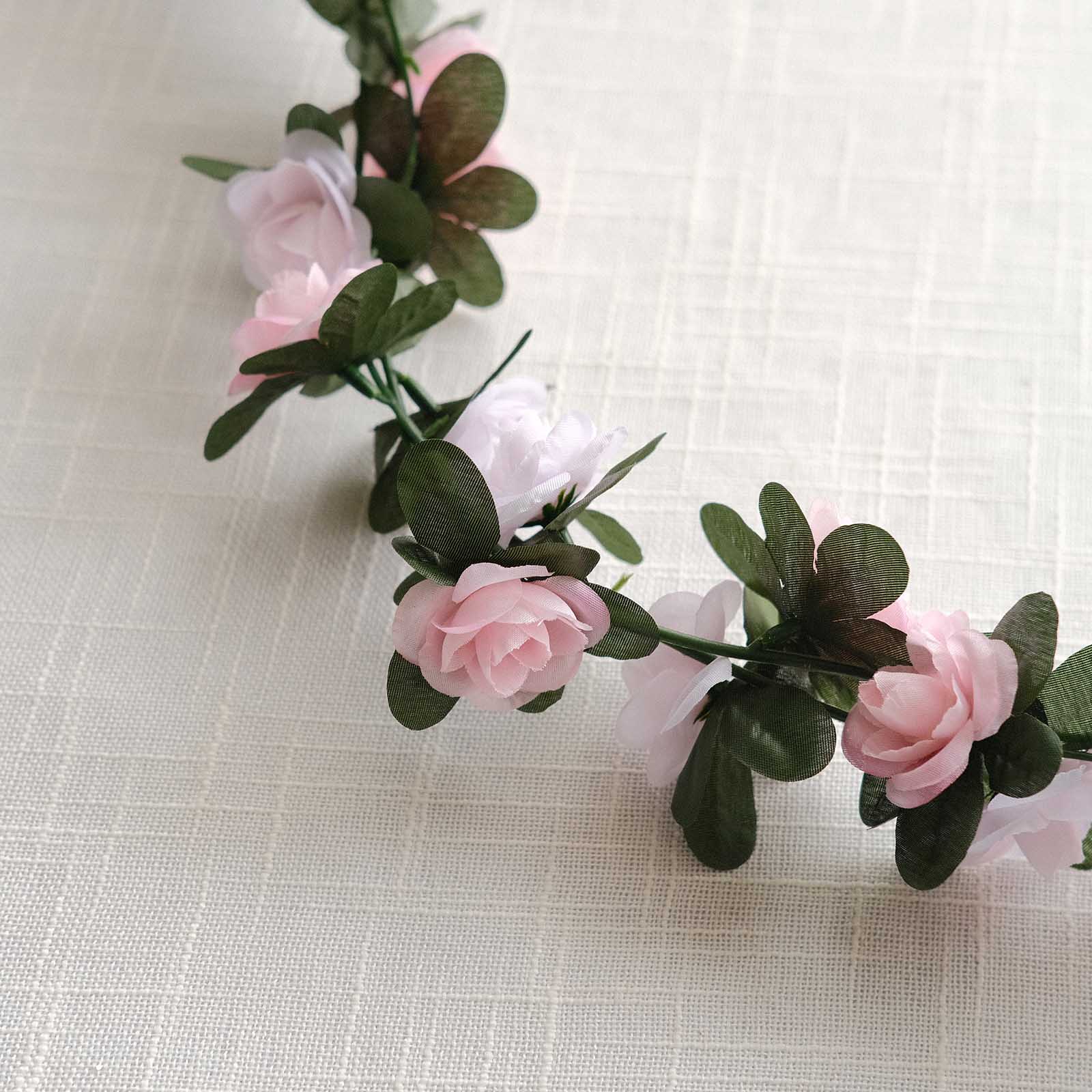 Blush dusty rose artificial silk flower garland with mini rose vines.