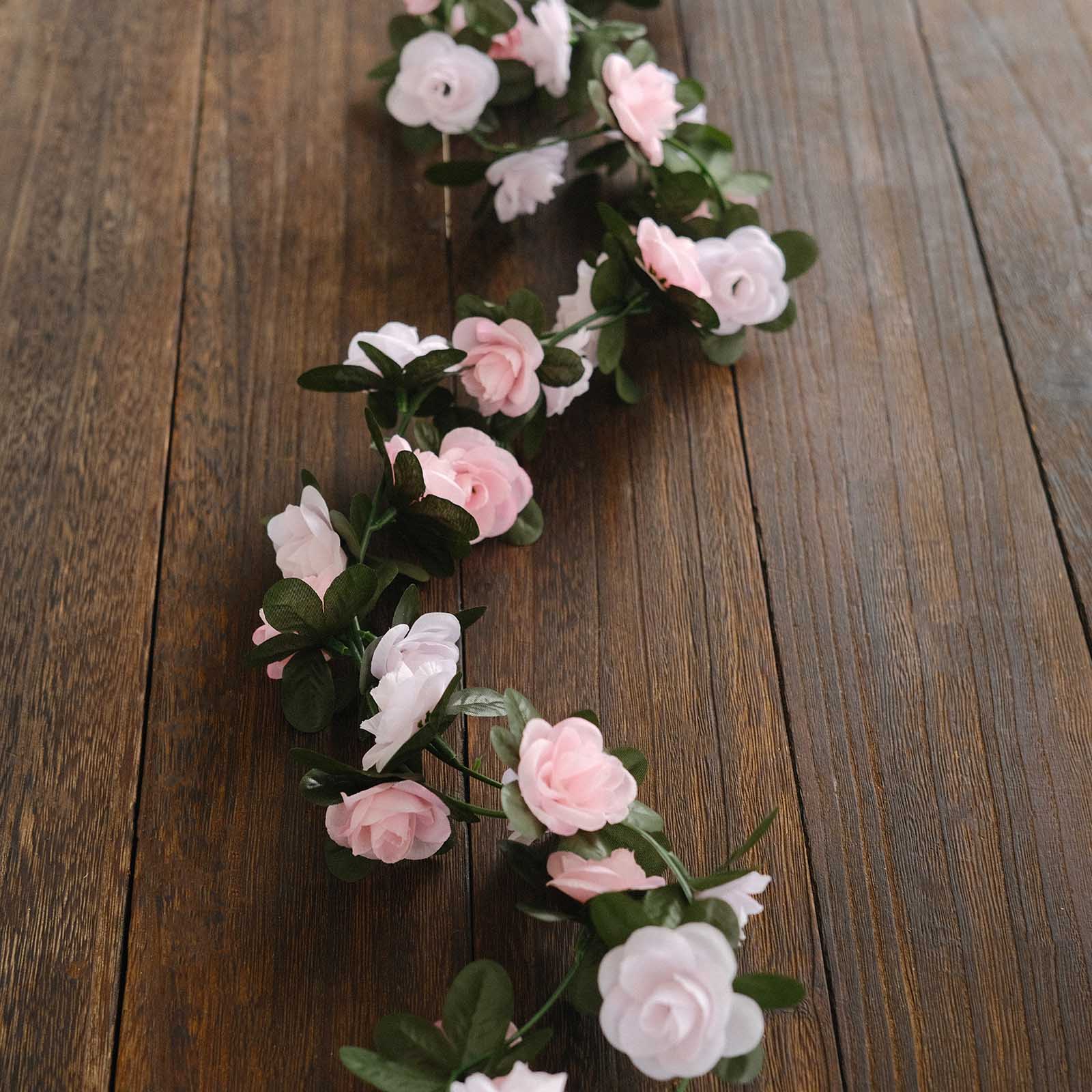 Blush dusty rose artificial silk flower garland with mini rose vines.