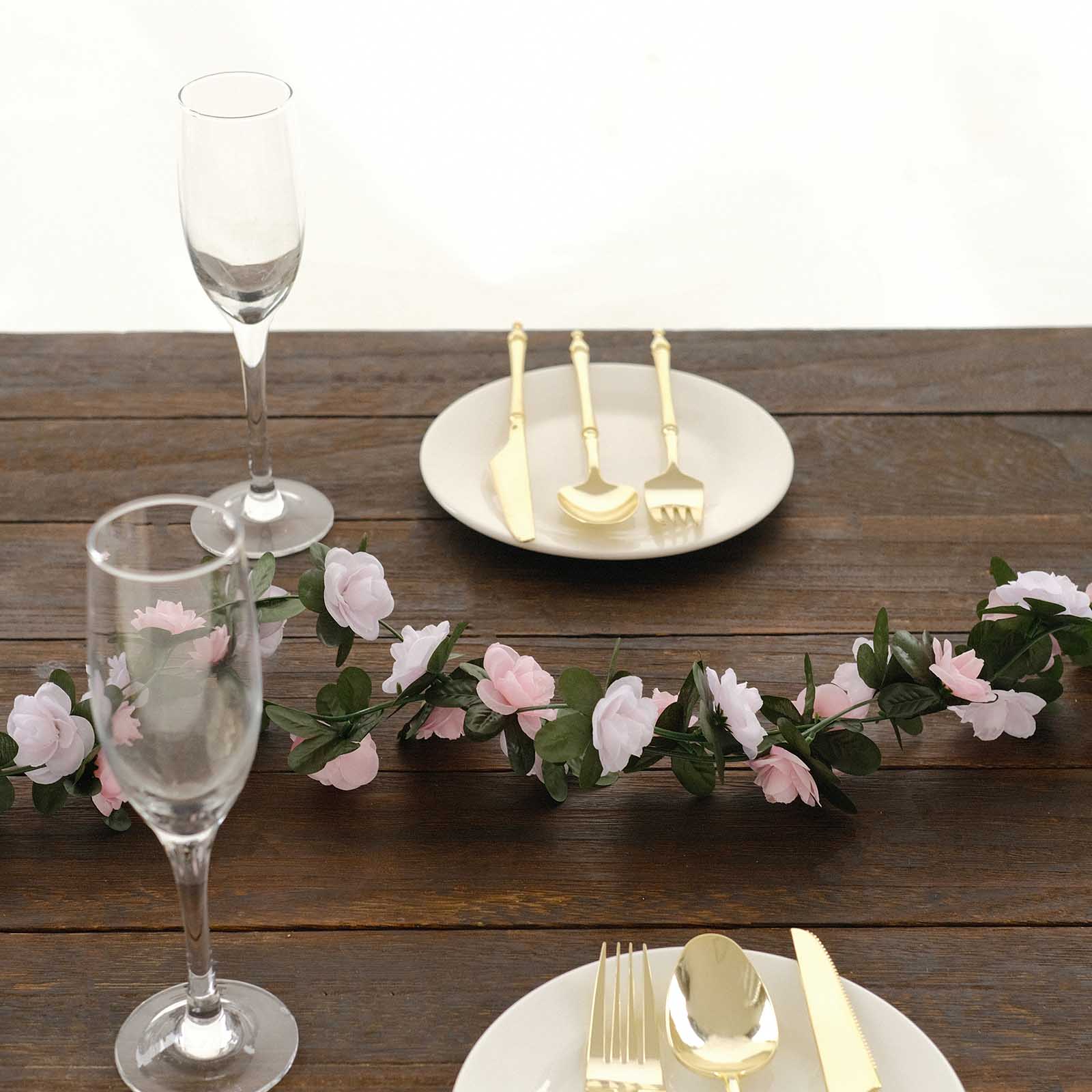 Blush dusty rose artificial silk flower garland with mini rose vines.