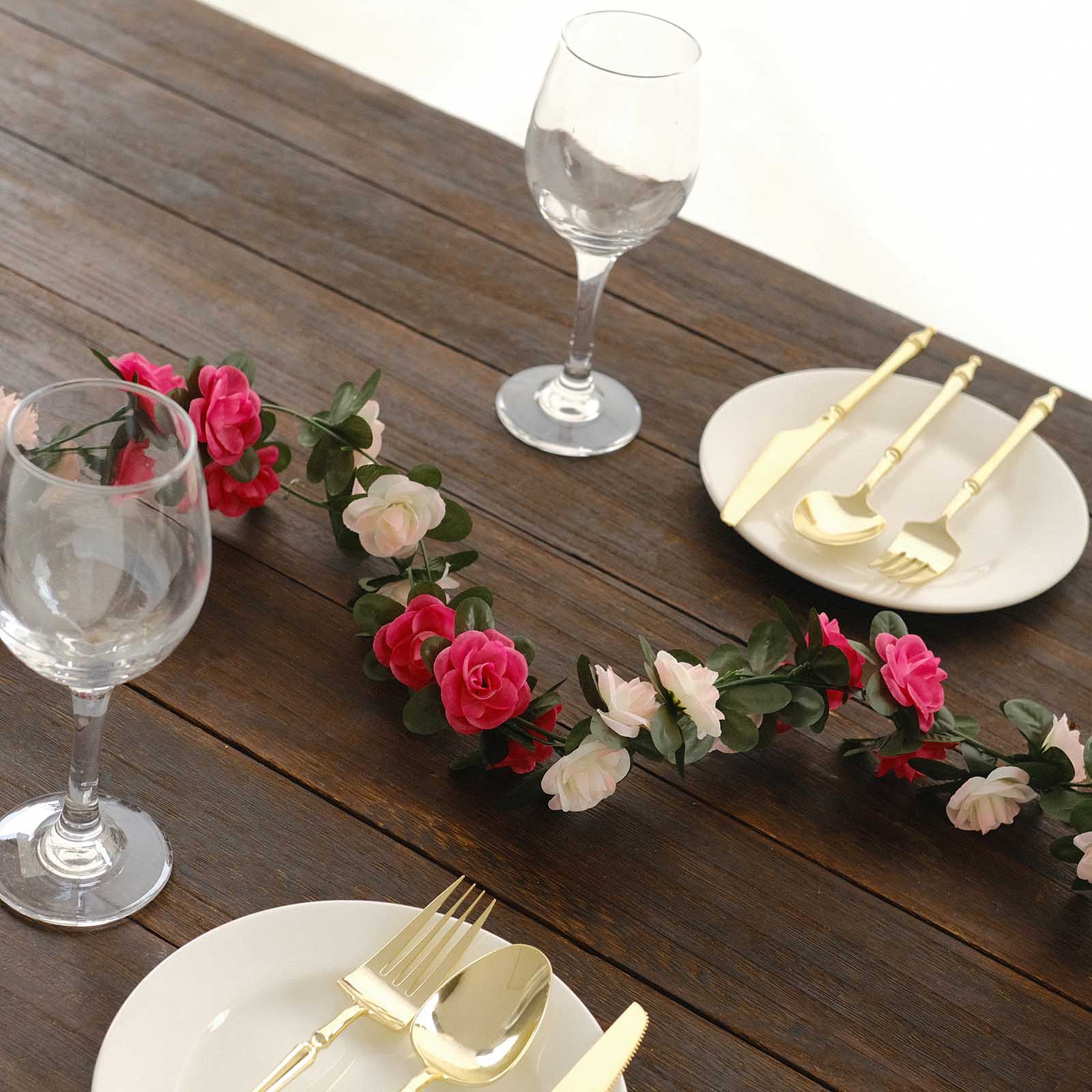 Blush fuchsia artificial silk flower garland with mini rose vines and 45 flower heads.